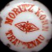 Porcelánový uzávěr ze sodovkárny Moritze Kohna